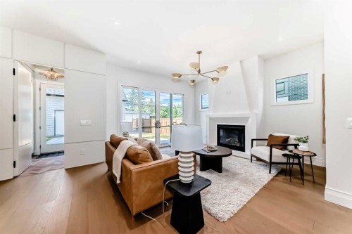 1610 49 Avenue Sw, Calgary, AB - Indoor Photo Showing Living Room With Fireplace
