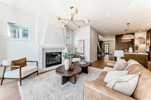 1610 49 Avenue Sw, Calgary, AB - Indoor Photo Showing Living Room With Fireplace