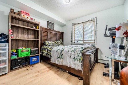 201-7180 80 Avenue Ne, Calgary, AB - Indoor Photo Showing Bedroom