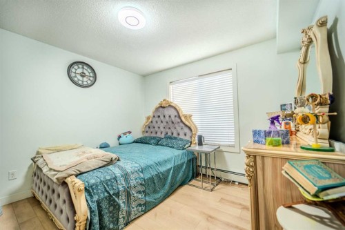 201-7180 80 Avenue Ne, Calgary, AB - Indoor Photo Showing Bedroom