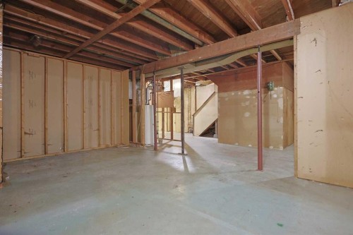 93 Winslow Crescent Sw, Calgary, AB - Indoor Photo Showing Basement