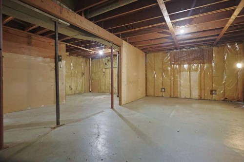 93 Winslow Crescent Sw, Calgary, AB - Indoor Photo Showing Basement