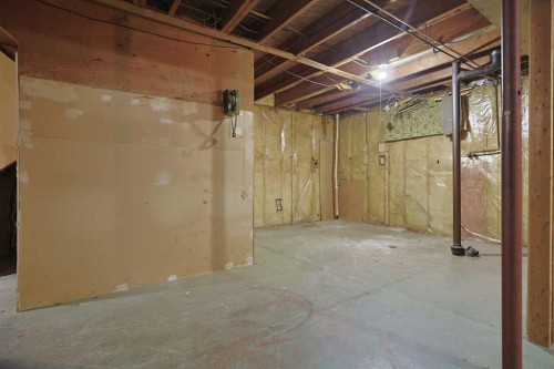 93 Winslow Crescent Sw, Calgary, AB - Indoor Photo Showing Basement