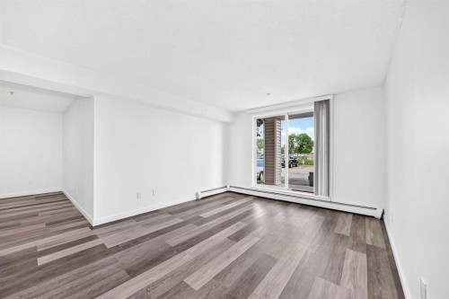 109-1717 60 Street Se, Calgary, AB - Indoor Photo Showing Other Room