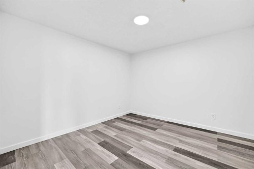 109-1717 60 Street Se, Calgary, AB - Indoor Photo Showing Other Room