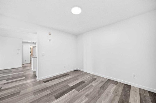 109-1717 60 Street Se, Calgary, AB - Indoor Photo Showing Other Room