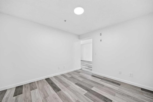 109-1717 60 Street Se, Calgary, AB - Indoor Photo Showing Other Room