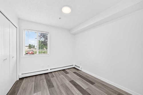 109-1717 60 Street Se, Calgary, AB - Indoor Photo Showing Other Room