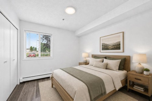 109-1717 60 Street Se, Calgary, AB - Indoor Photo Showing Bedroom