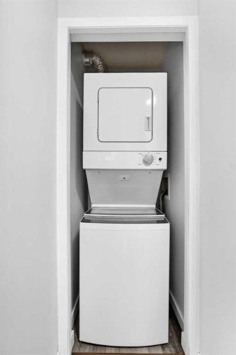 109-1717 60 Street Se, Calgary, AB - Indoor Photo Showing Laundry Room