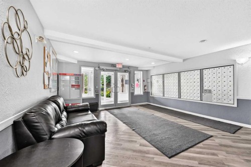 109-1717 60 Street Se, Calgary, AB - Indoor Photo Showing Other Room