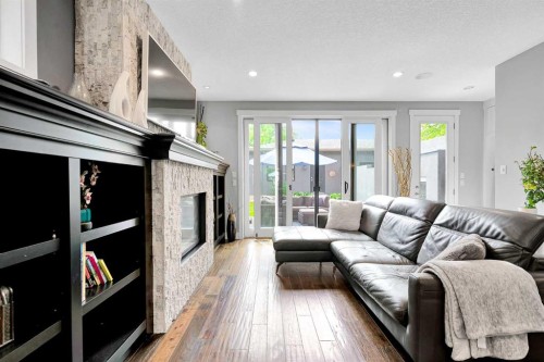 425 21 Avenue Nw, Calgary, AB - Indoor Photo Showing Living Room With Fireplace