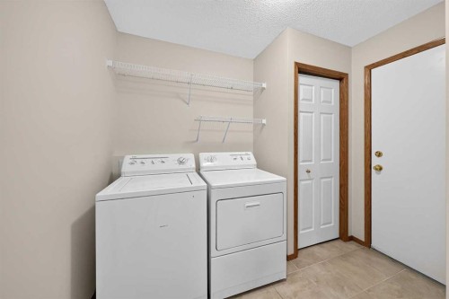 307 Edgeridge Gardens Nw, Calgary, AB - Indoor Photo Showing Laundry Room