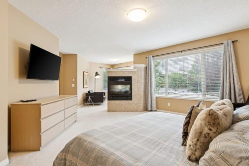 51 Sienna Park Crescent Sw, Calgary, AB - Indoor With Fireplace