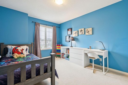 51 Sienna Park Crescent Sw, Calgary, AB - Indoor Photo Showing Bedroom
