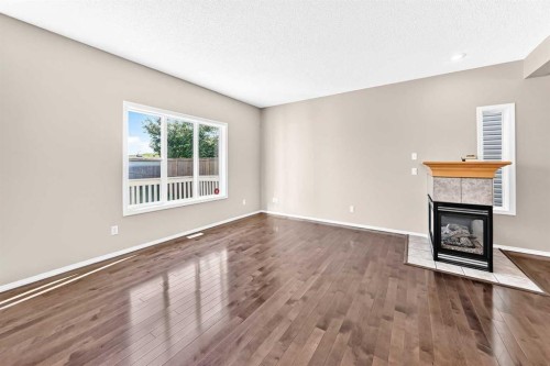 16 Royal Birch Rise Nw, Calgary, AB - Indoor With Fireplace
