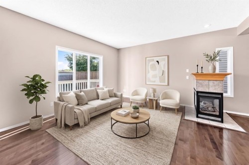 16 Royal Birch Rise Nw, Calgary, AB - Indoor Photo Showing Living Room With Fireplace