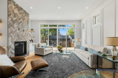 2311 6 Avenue Nw, Calgary, AB - Indoor Photo Showing Living Room With Fireplace