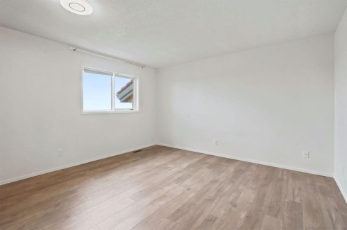 84-5810 Patina Drive Sw, Calgary, AB - Indoor Photo Showing Other Room