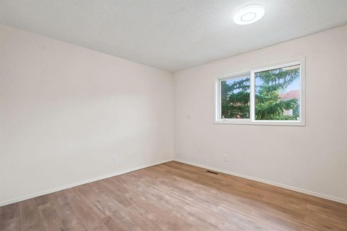 84-5810 Patina Drive Sw, Calgary, AB - Indoor Photo Showing Other Room
