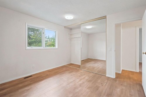 84-5810 Patina Drive Sw, Calgary, AB - Indoor Photo Showing Other Room
