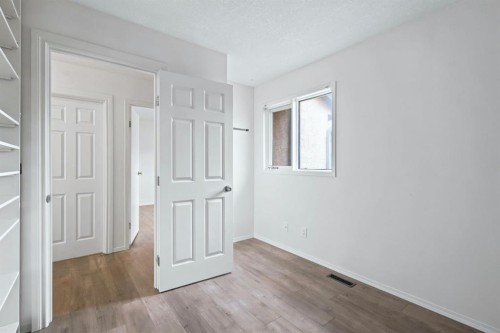 84-5810 Patina Drive Sw, Calgary, AB - Indoor Photo Showing Other Room