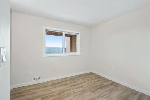 84-5810 Patina Drive Sw, Calgary, AB - Indoor Photo Showing Other Room