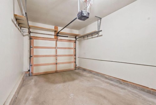 84-5810 Patina Drive Sw, Calgary, AB - Indoor Photo Showing Garage