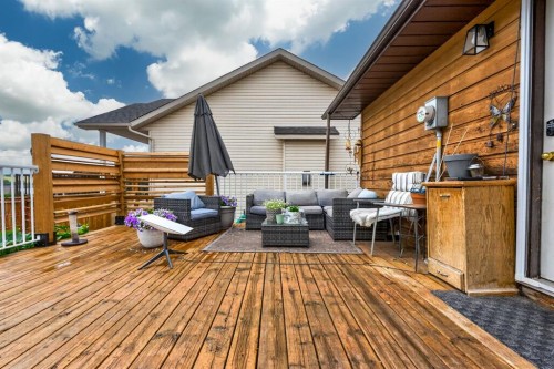 121 Edey Close, Cremona, AB - Outdoor With Deck Patio Veranda With Exterior