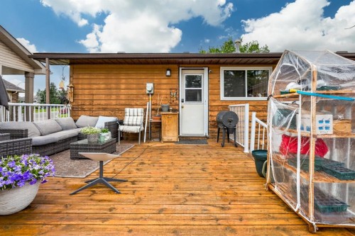121 Edey Close, Cremona, AB - Outdoor With Deck Patio Veranda With Exterior