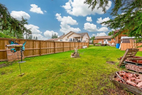 121 Edey Close, Cremona, AB - Outdoor With Backyard