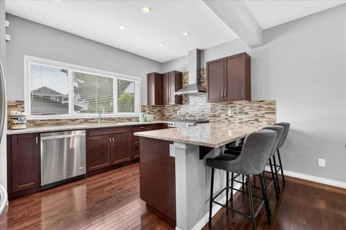 60 Mahogany Grove Se, Calgary, AB - Indoor Photo Showing Kitchen With Upgraded Kitchen