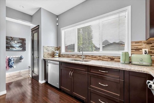 60 Mahogany Grove Se, Calgary, AB - Indoor Photo Showing Kitchen With Double Sink