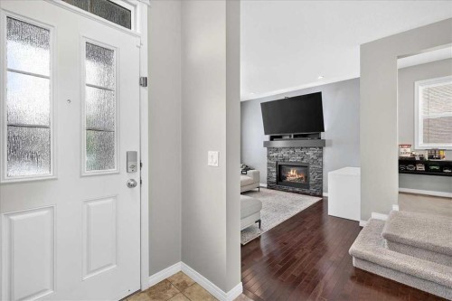 60 Mahogany Grove Se, Calgary, AB - Indoor Photo Showing Other Room With Fireplace
