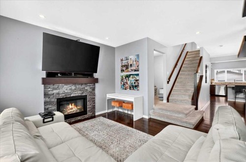 60 Mahogany Grove Se, Calgary, AB - Indoor Photo Showing Living Room With Fireplace