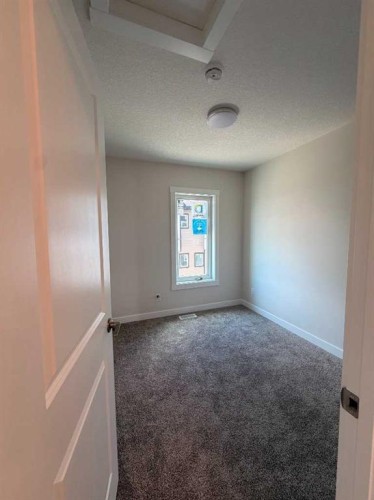 205-4115 206 Avenue Se, Calgary, AB - Indoor Photo Showing Other Room