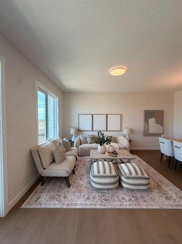 205-4115 206 Avenue Se, Calgary, AB - Indoor Photo Showing Living Room