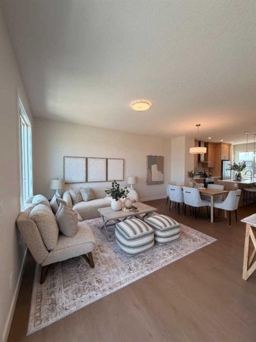 205-4115 206 Avenue Se, Calgary, AB - Indoor Photo Showing Living Room