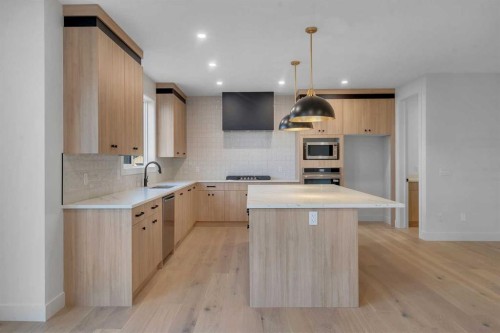 111 North Bridges Garden, Langdon, AB - Indoor Photo Showing Kitchen With Upgraded Kitchen