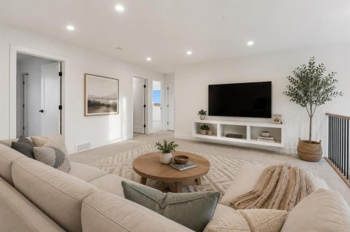 111 North Bridges Garden, Langdon, AB - Indoor Photo Showing Living Room