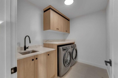 111 North Bridges Garden, Langdon, AB - Indoor Photo Showing Laundry Room
