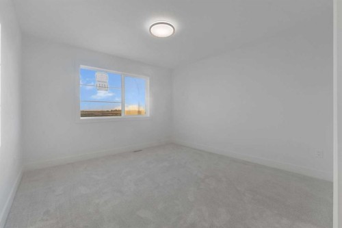 111 North Bridges Garden, Langdon, AB - Indoor Photo Showing Other Room