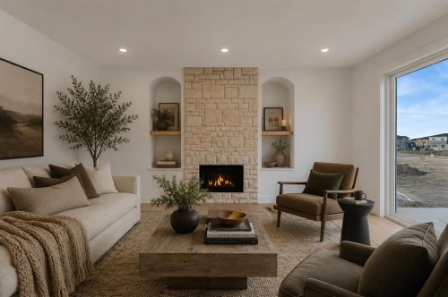 111 North Bridges Garden, Langdon, AB - Indoor Photo Showing Living Room With Fireplace