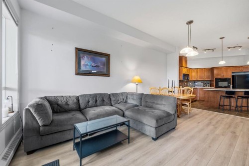 107-3101 34 Avenue Nw, Calgary, AB - Indoor Photo Showing Living Room