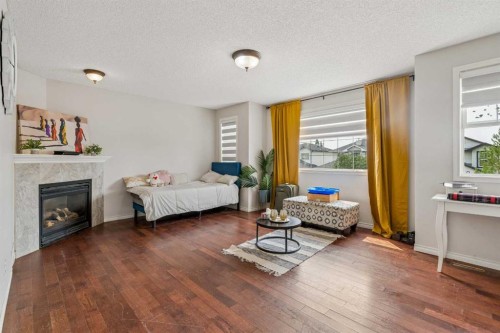 181 Tuscarora Place Nw, Calgary, AB - Indoor With Fireplace