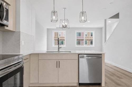207-75 Cornerstone Row Ne, Calgary, AB - Indoor Photo Showing Kitchen With Upgraded Kitchen