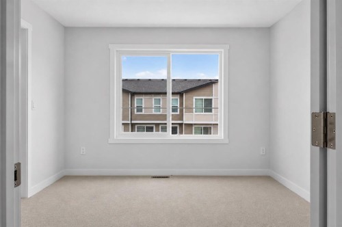 207-75 Cornerstone Row Ne, Calgary, AB - Indoor Photo Showing Other Room