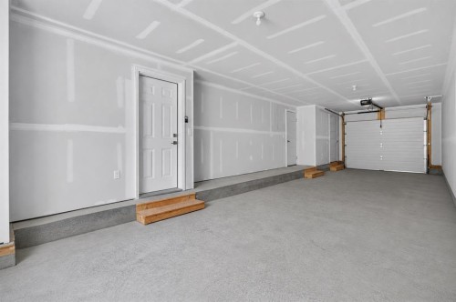 207-75 Cornerstone Row Ne, Calgary, AB - Indoor Photo Showing Garage