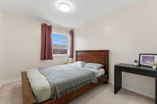 50 Somerglen Park Sw, Calgary, AB - Indoor Photo Showing Bedroom