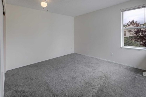 57 Sandpiper Lane Nw, Calgary, AB - Indoor Photo Showing Other Room
